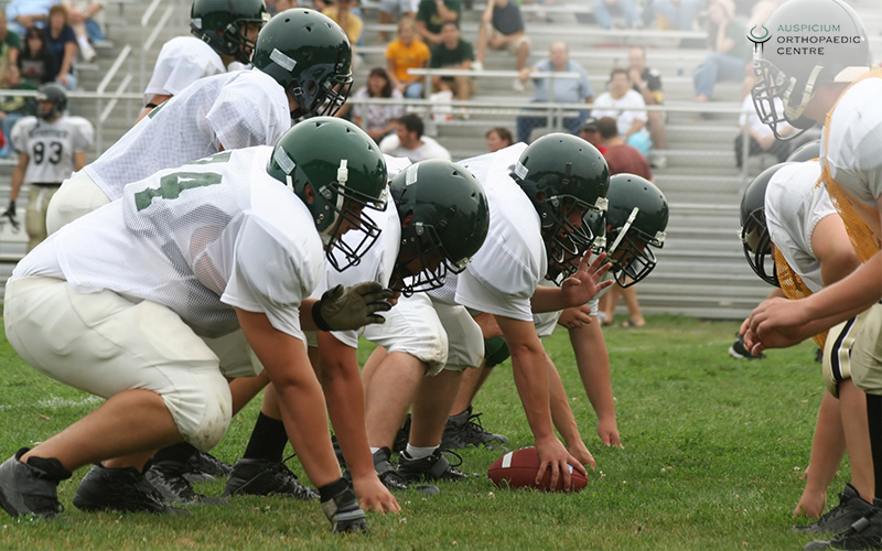 Image of people playing rugbyAmerican football